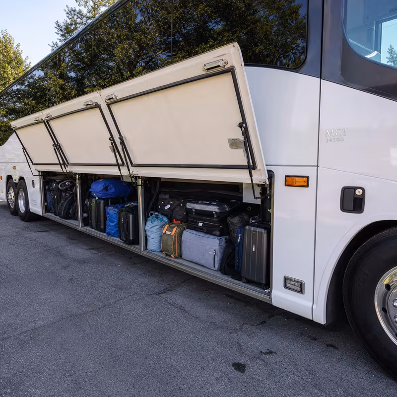 Party bus interior with wraparound leather seating and LED lighting in Las Vegas