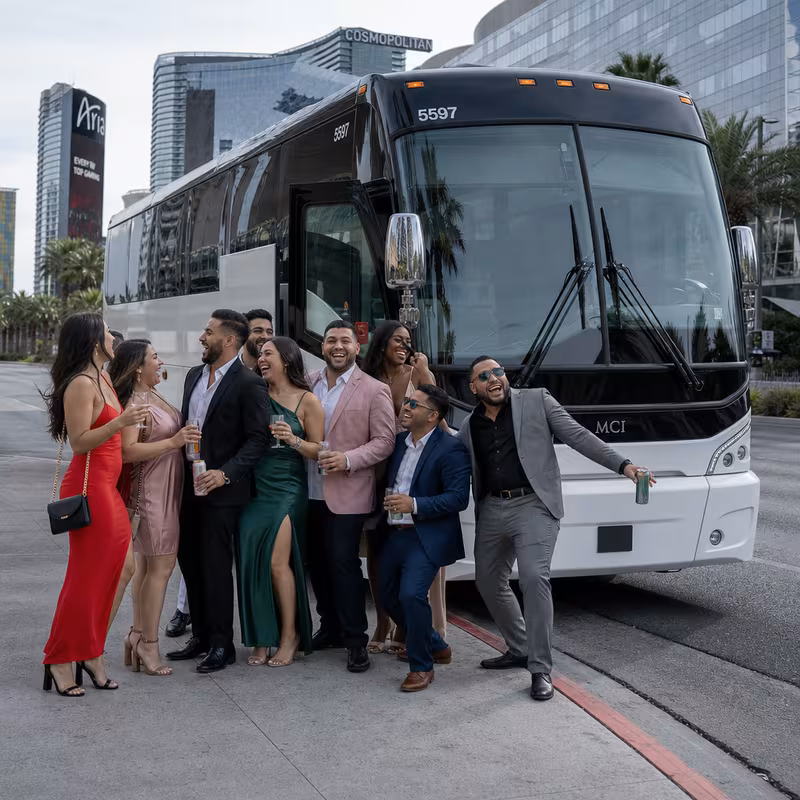 Passengers loading luggage while boarding an Las Vegas group shuttle
