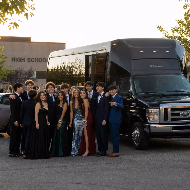 Group boarding a white charter bus for Prom & Homecoming Transportation transportation in Las Vegas