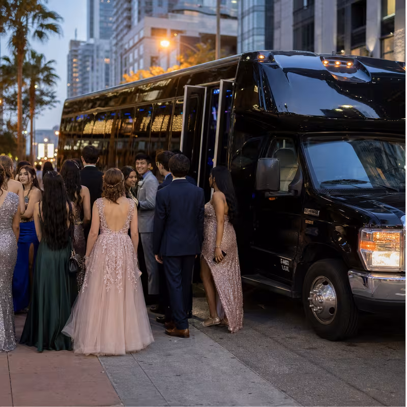 Passengers loading luggage while boarding an Las Vegas group shuttle