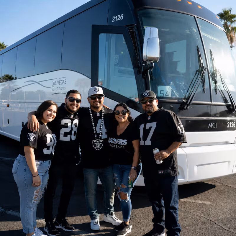 Passengers loading luggage while boarding an Las Vegas group shuttle
